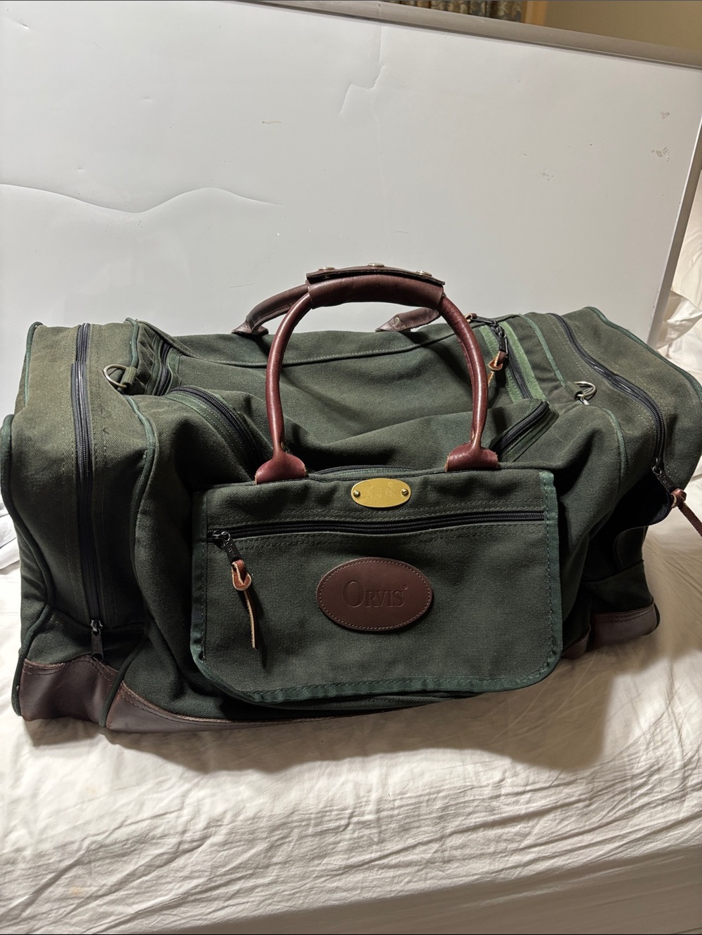 Orvis Dark Green Canvas Duffel with Brown Leather Trim. EUC
